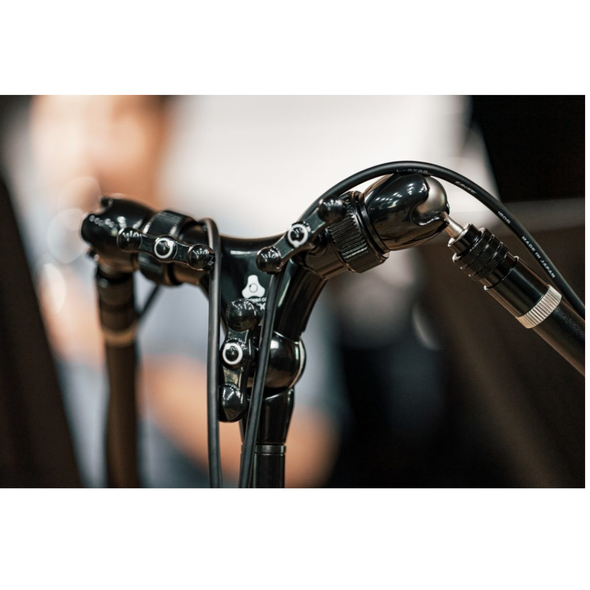 O2x – Dual Arm Orbital Boom with Interchangeable Arms